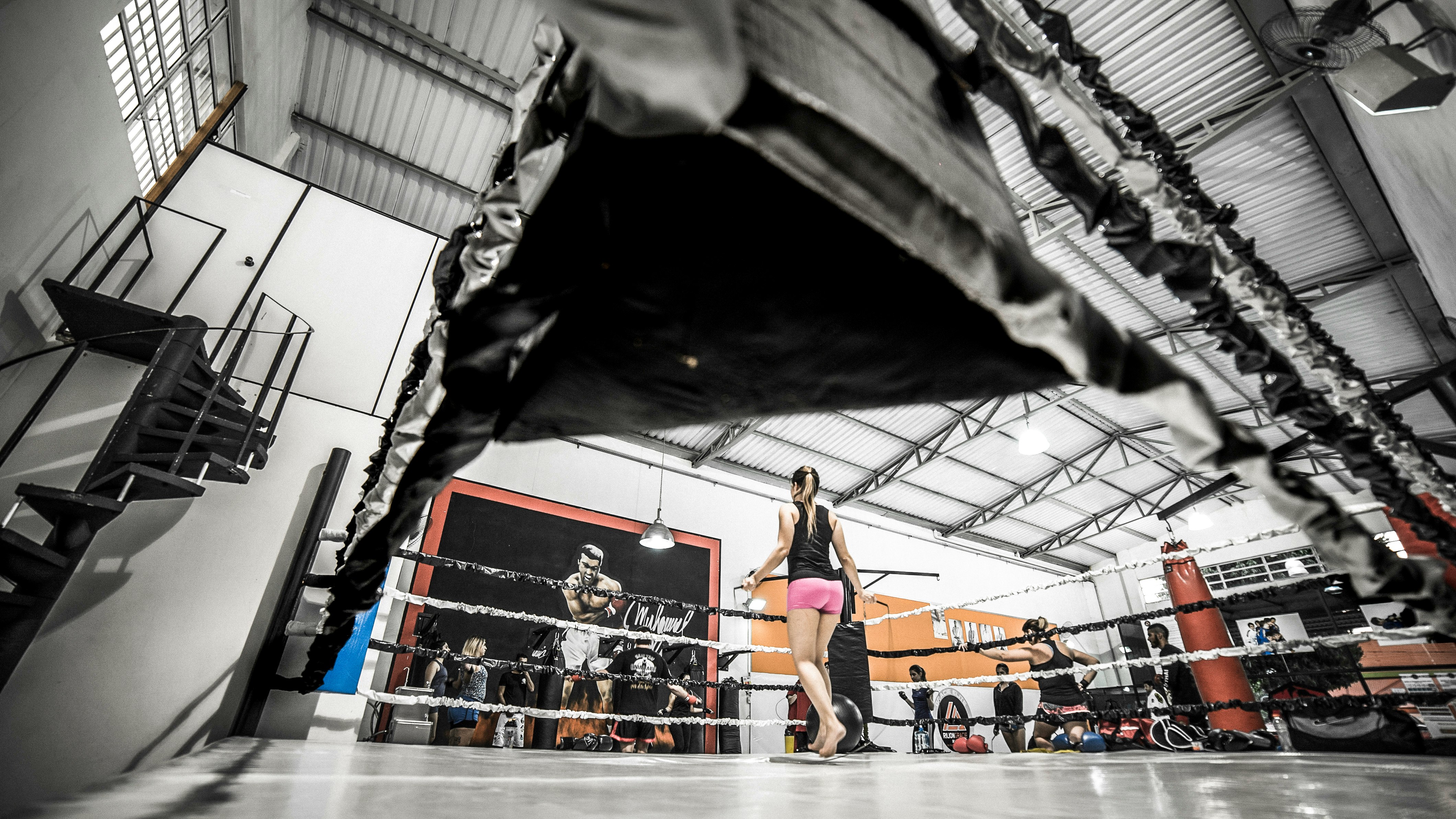 woman standing on boxing ring